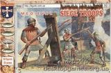 Medieval siege crew and handgunners